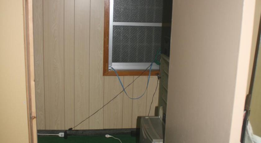 Отель Koza Share House Окинава Номер фото
